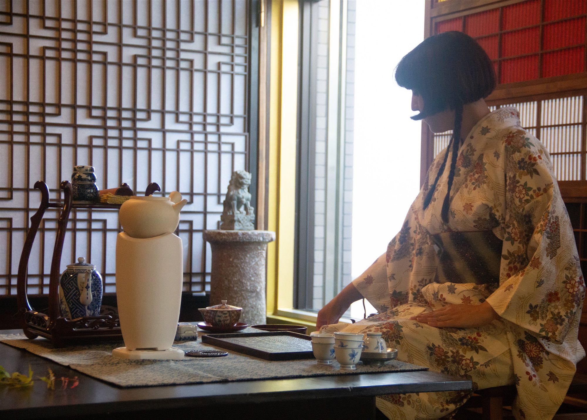 Host preparing tea at the table